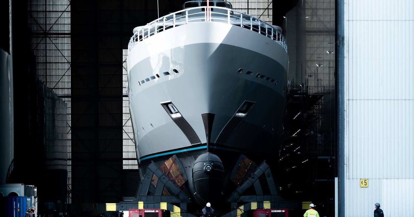 Oceanco's 92.8-metre Draak leaving the refit facility after her comprehensive rebuild
